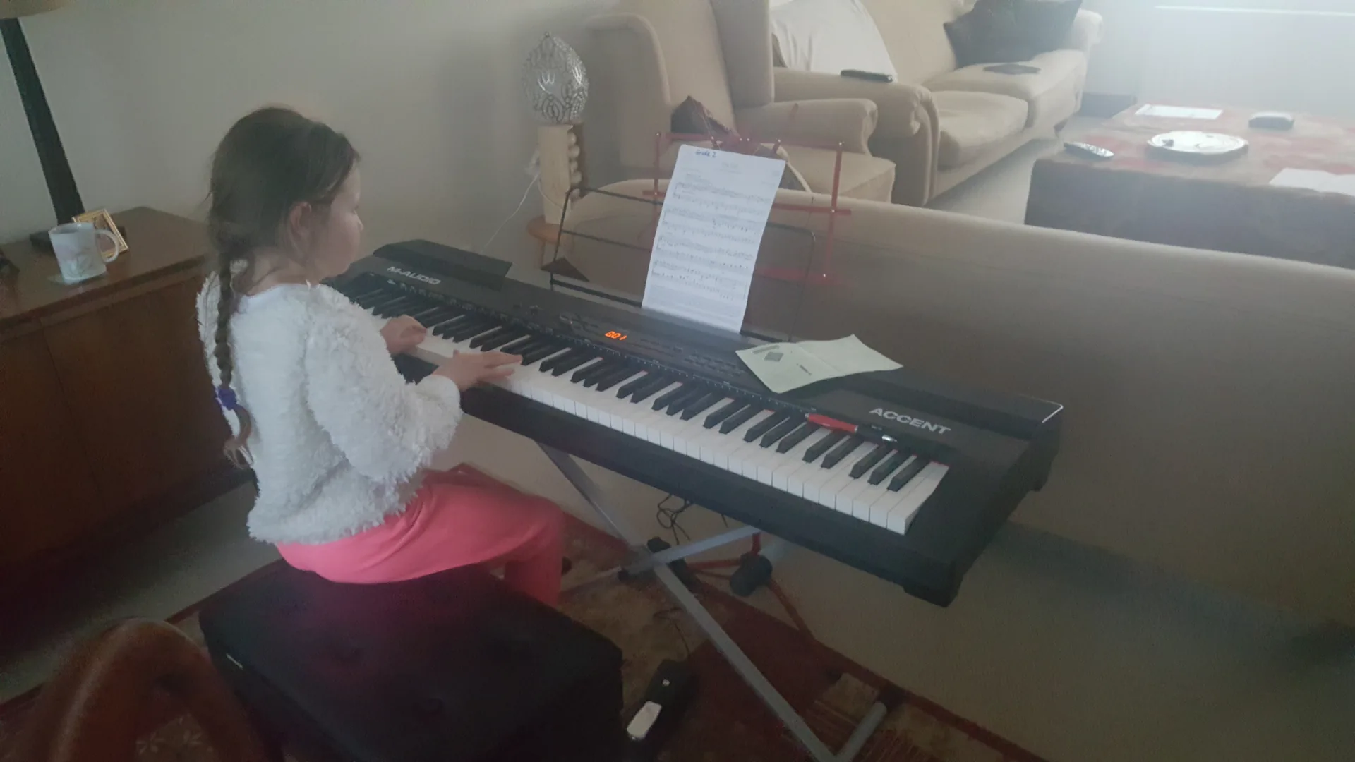 Mia at age 5, beginning her musical journey