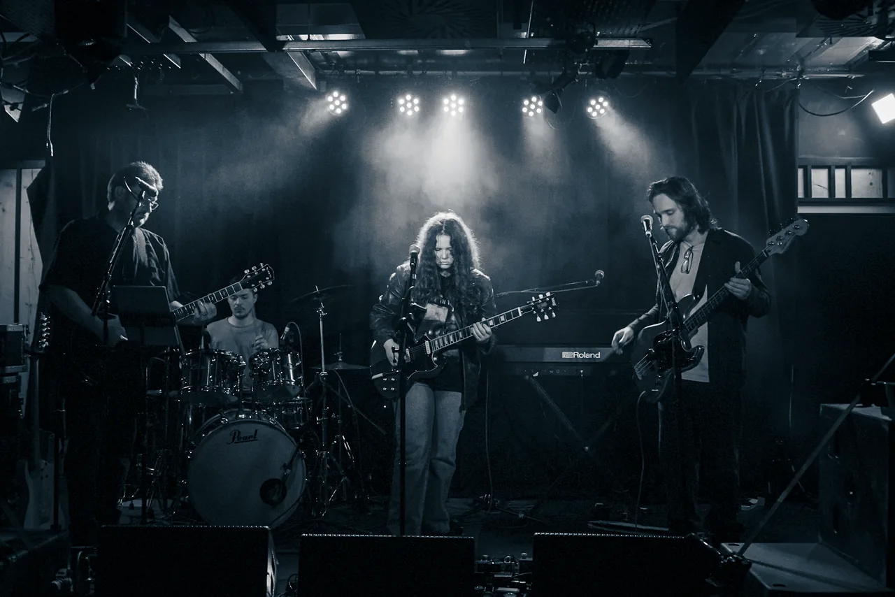 The Electric Age - Mia with double-neck guitar